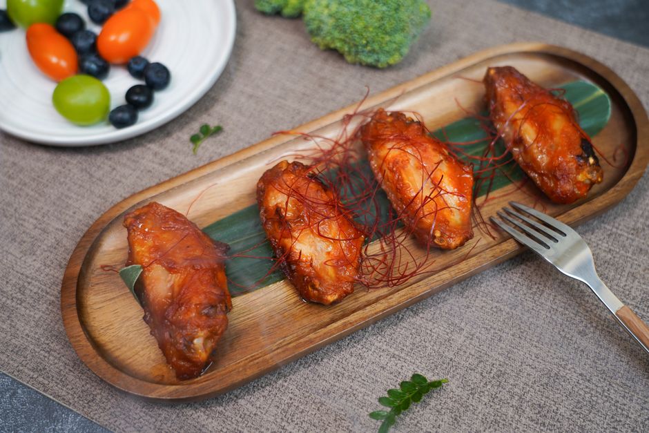 Buffalo wings appetizer served in a restaurant setting