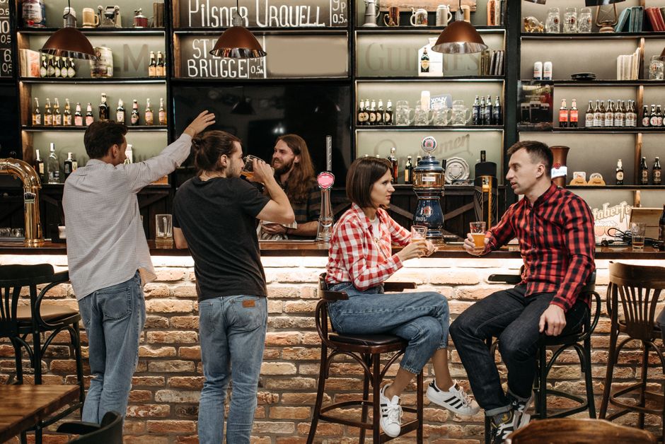 Craft beer bar with various beer selections and taps