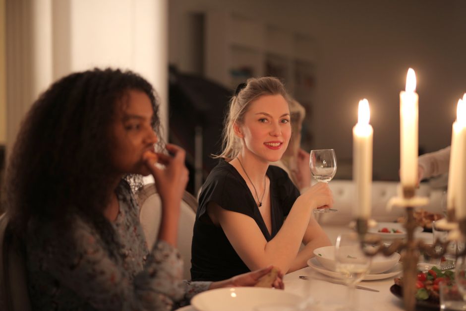 Friends gathering at a restaurant dining together